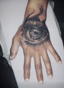 Tatuaje ojo mano